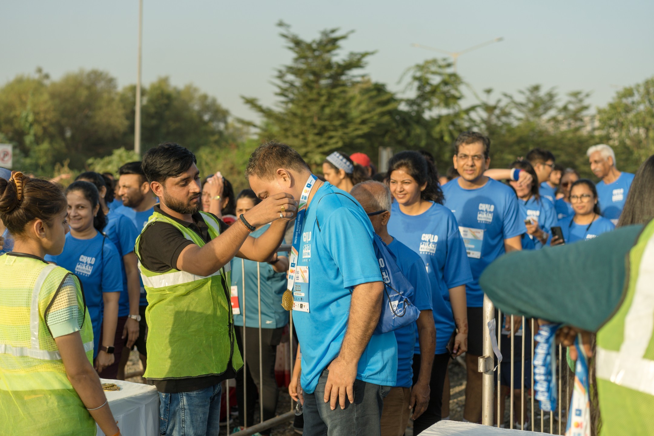 Participant receiving finisher's medal